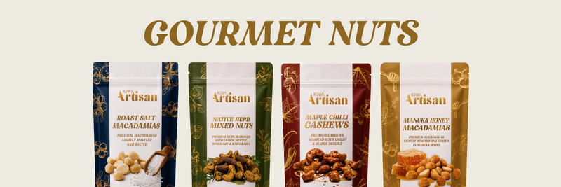 Five packages of gourmet nuts with 'Artisan' branding on a beige background.