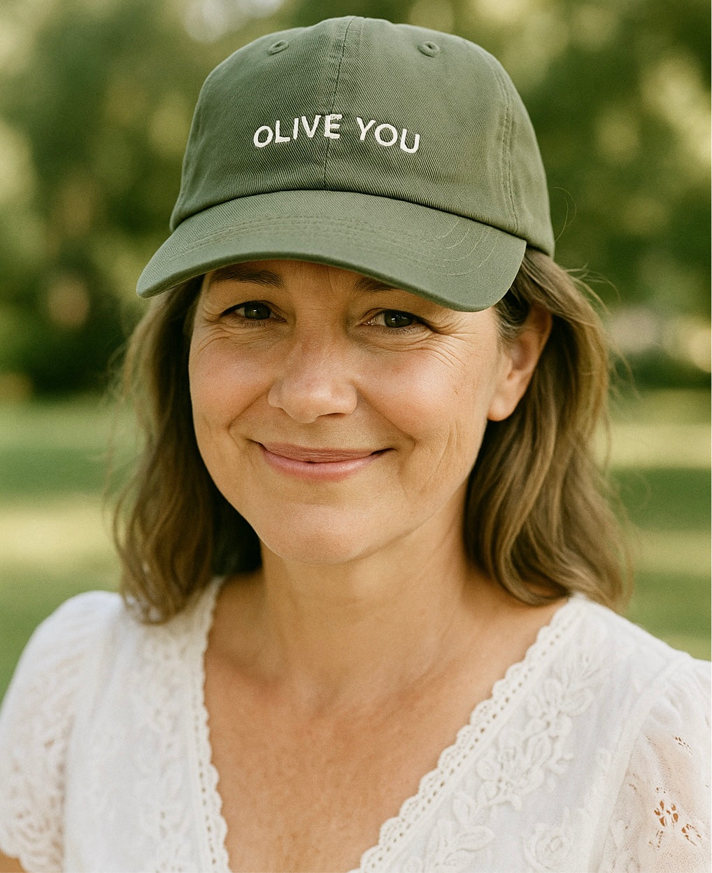 Woman wearing Green Cap with 'Olive You' Print