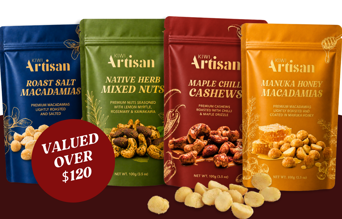 Four Kiwi Artisan macadamia nut pouches lined up against a dark background, with a red circular badge reading 'VALUED OVER $120'. The pouches are in blue, red, green, and gold packaging, and several roasted macadamia nuts are shown in front.