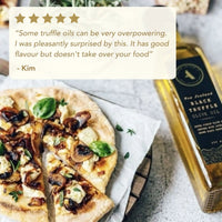 Pizza with truffle oil bottle and customer review text overlay