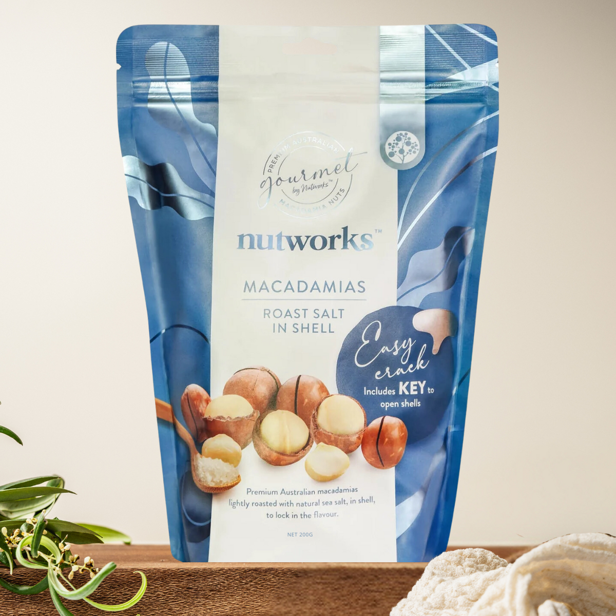 Premium macadamia kernels in shell – dry roasted and salted for perfect crunch