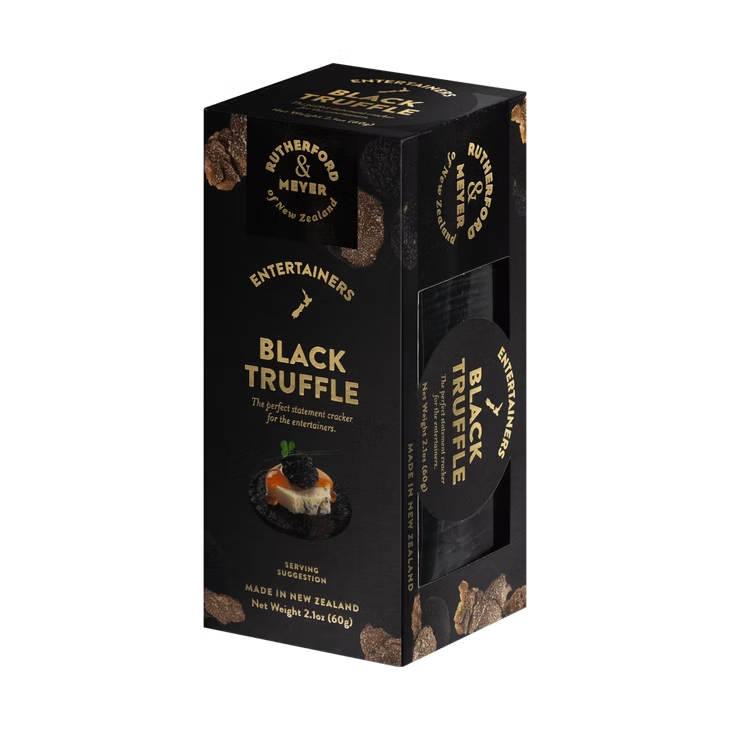 Black truffle packaging with gold text on a white background