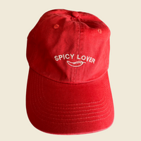 Orange-red cap with Spicy Lover print